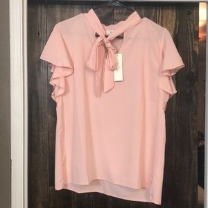 Pink short sleeve tie at neck blouse